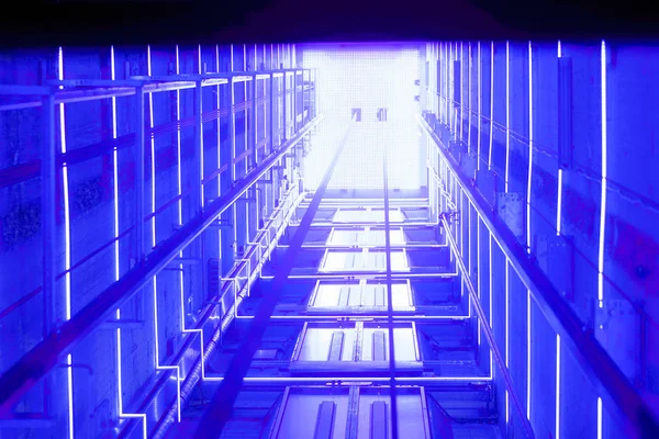 Blue Luminous Lift Tunnel