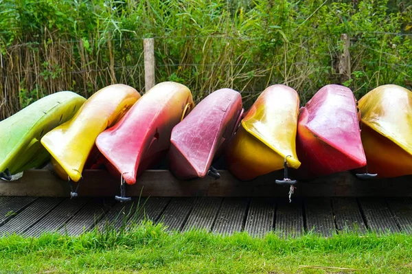 Inverted canoe boats — Stock Photo, Image