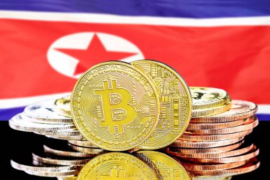 Kuzey Kore bayrağı arka plan üzerinde bitcoins