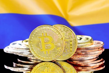 bitcoins on Ukraine flag background