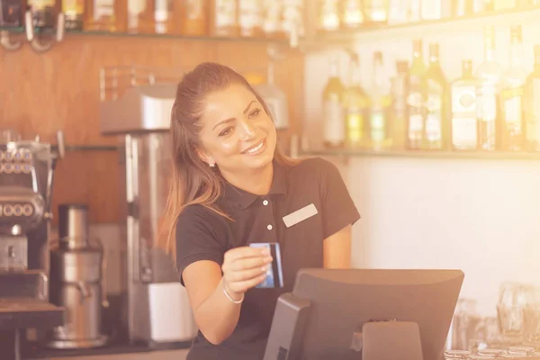The waitress at the cash register — Stock Photo, Image