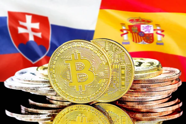 Bitcoins on Slovakia and Spain flag background — Stock Photo, Image