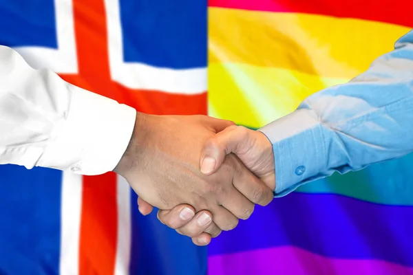 Stretta di mano su Islanda e LGBT bandiera gay sfondo . — Foto Stock