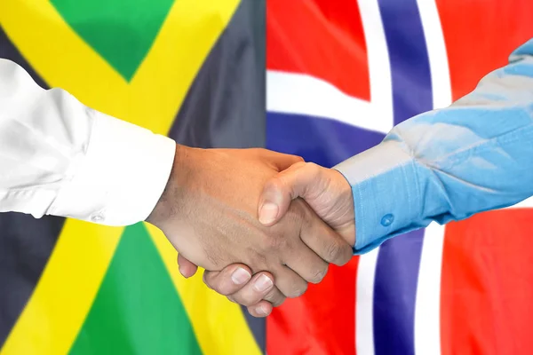 握手牙买加和挪威国旗背景. — 图库照片