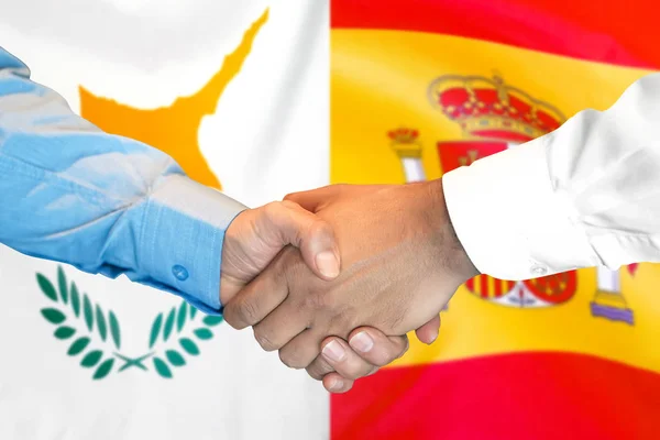 Handshake em Chipre e Espanha Bandeira de fundo . — Fotografia de Stock