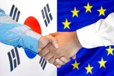 Güney Kore ve Avrupa Birliği bayrak arka plan el sıkışma.