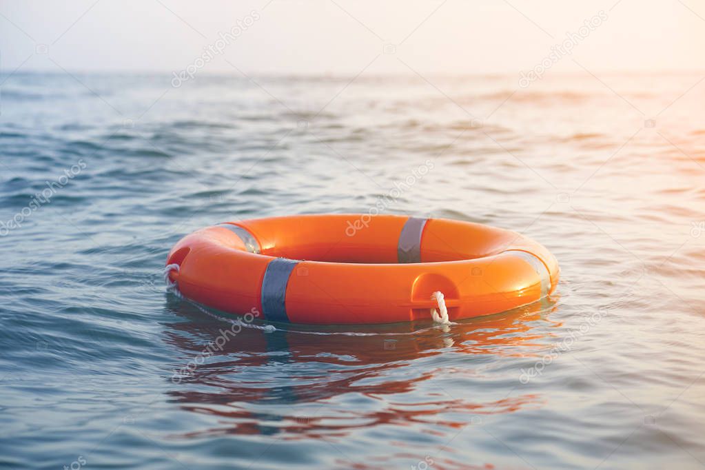 Orange lifebuoy pool ring float