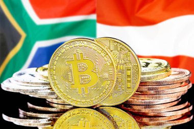 Güney Afrika ve Avusturya bayrak arkaplanındaki Bitcoinler