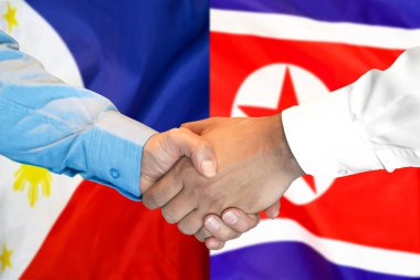 Filipinler ve Kuzey Kore bayrak geçmişi üzerine el sıkışma.