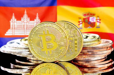 Kamboçya ve İspanya 'daki kripto para birimi ve engelleme teknolojisi yatırımcıları için konsept. Kamboçya ve İspanya bayrağının arka planında bitcoinler.