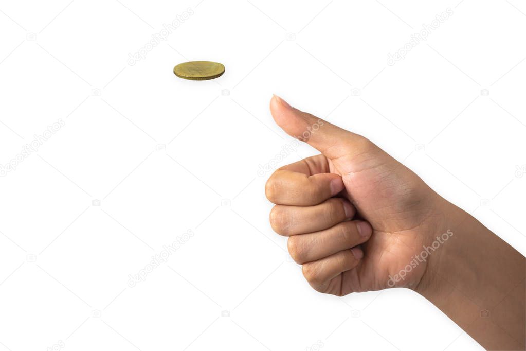 Hand of businessman tossing a golden coin isolated on white background.