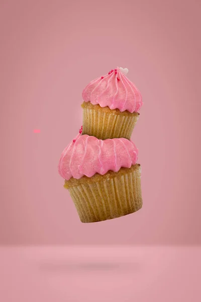 Flying Cupcakes Pink Background Idea Minimal Concept New Year Christmas — Stock Photo, Image