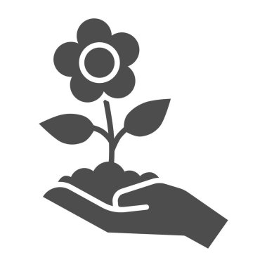 Flower in soil on human hand solid icon, gardening concept, Spring flower with leaves sign on white background, hand holds handful of soil with flower icon in glyph style. Vector graphics.