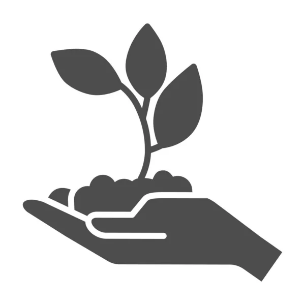 Young sprout with three leaves in hand solid icon, ecology concept, seedling with handful of soil on hand sign on white background, young growth icon in glyph style for mobile. Vector graphics. — Stock vektor