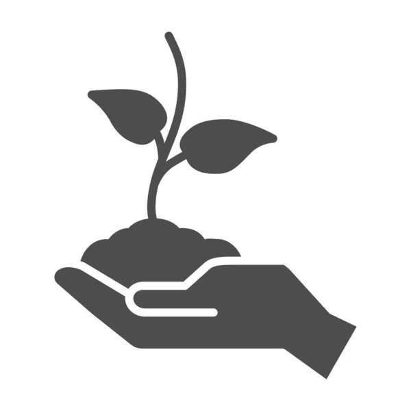 Young sprout in hand solid icon, care nature concept, Hand holding seedling in soil symbol on white background, Plant in caring hand icon in glyph style for mobile, web. Vector graphics. — Stock vektor