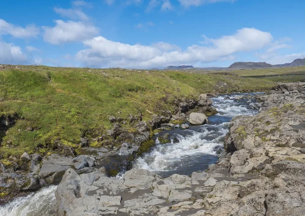 Beautiful lush green Landscape of Skoga river valley cascades near Skogafoss waterfall and Skogar end of Fimmvorduhals hiking trail. South Iceland, Summer blue sky — Stock Photo, Image
