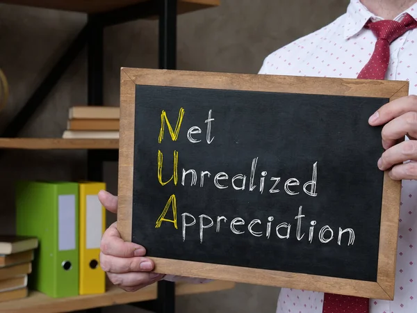 Net unrealized appreciation NUA is shown on the conceptual business photo — Stock Photo, Image