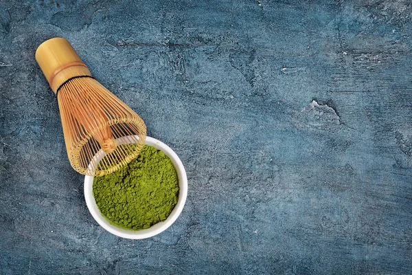 Top View Organic Green Matcha Teapowder White Bowl Blue Concrete — Stock Photo, Image