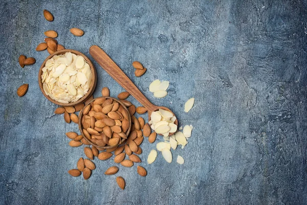 Top View Almond Slices Whole Nut Wooden Bowls Spoon Ingredient — Stock Photo, Image