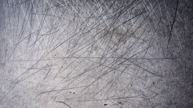Gri grunge metalik doku arka plan tasarımı için çizikler ile