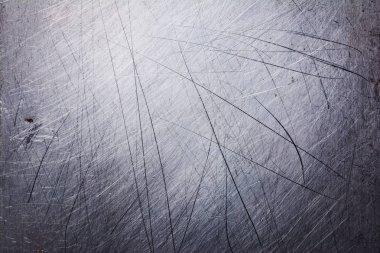 Gri grunge metalik doku arka plan tasarımı için çizikler ile
