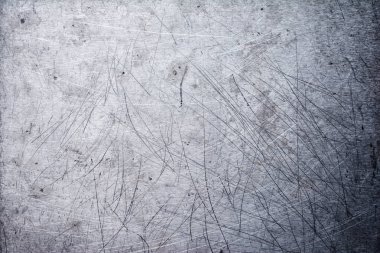 Gri grunge metalik doku arka plan tasarımı için çizikler ile