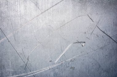 Gri grunge metalik doku arka plan tasarımı için çizikler ile yakın çekim