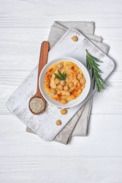 Traditional homemade chickpea hummus snack with spice of rosemary — Stock Photo, Image