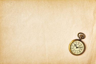 Sararmış kağıt üzerinde Vintage bronz cep saati