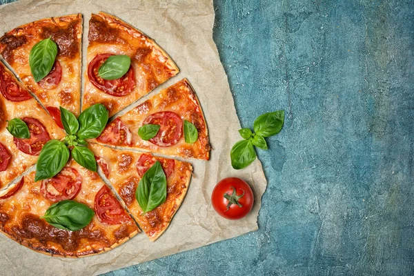 Pizza margarita with tomato, cheese and basil