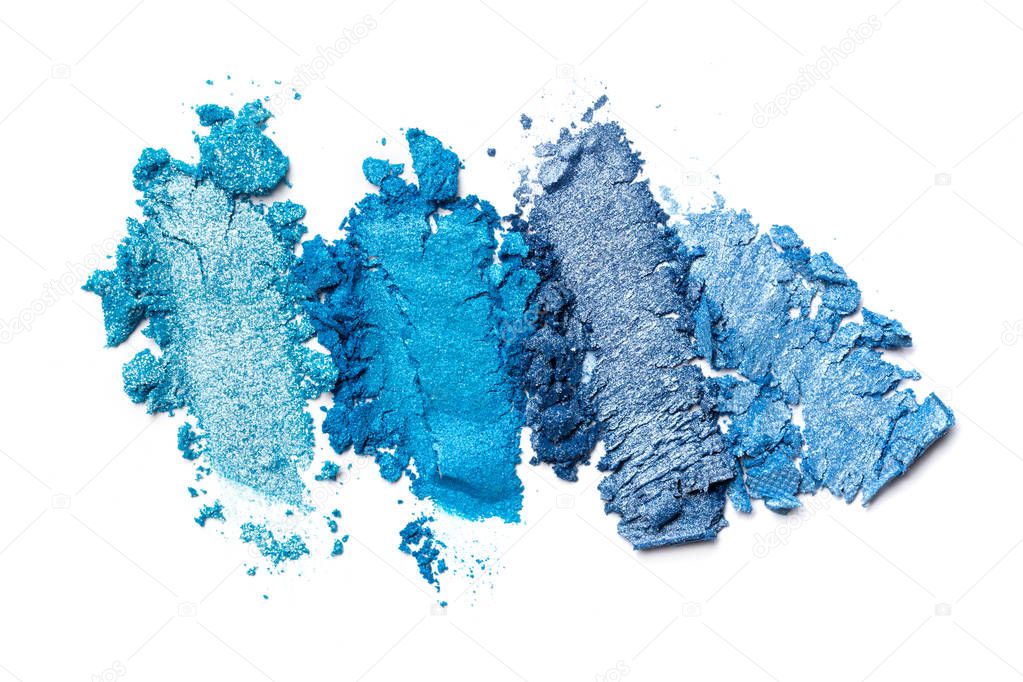 Smear of bright blue and turquoise eyeshadow