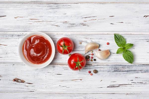 Spicy tomato ketchup sauce with Cherry tomatoes, garlic and basil — Stock Photo, Image