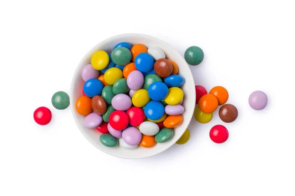 Sweet multicolored dragee in white bowl — Stock Photo, Image