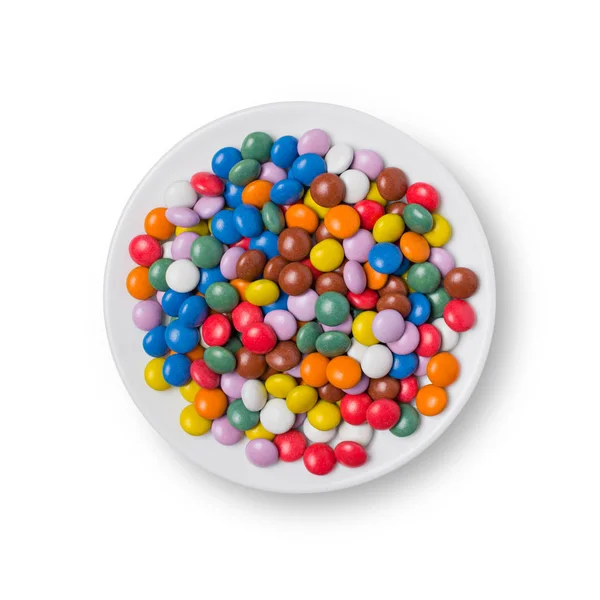 Sweet multicolored dragee in white bowl — Stock Photo, Image