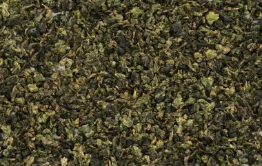 Oolong geleneksel Çince koyu yeşil izole çay arka plan haddelenmiş yaprakları