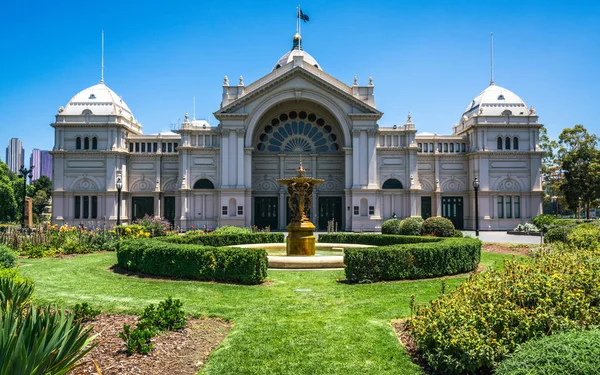 Royal Exhibition Building east side and Carlton Gardens with fountain view in Melbourne Victoria Australia