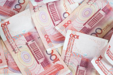 Closeup Çin yuan faturaları masada. Yuan Çin, seçici odak birimidir yüz Çin yuan banknot para arka plan sesi için yığını üzerinde.