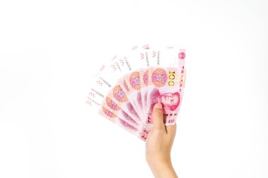 Çin yuan banknotlar beyaz arka plan üzerinde tutan el. Veren ve Çin para (rmb veya renminbi eller kapatın)