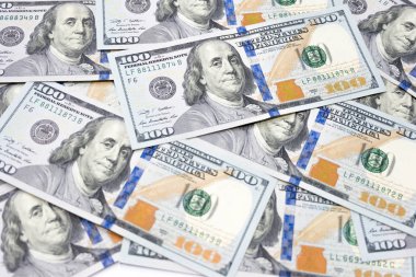 Para arka plan iş ve finansal kavramı için kullanılan 100 Amerikan Doları faturaları ile.