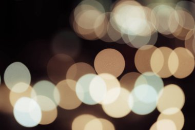 Soyut ışıkları gece hayatı bokeh arka plan bulanık veya retro vintage renk tonlu parti.
