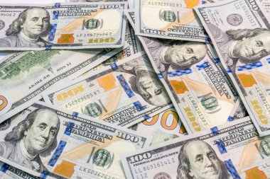Yüz dolarlık banknotlar tablo arka planı olarak bir sürü.