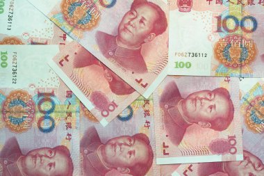Yüz Çin yuan faturaları yığını para arka plan olarak. Çin'in para birimi.