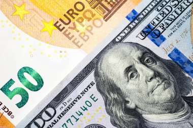 Dolar ve euro banknot arka planda Döviz, Döviz Ticaret, ekonomik rekabet ve Amerika ve Avrupa arasındaki ilişki kavramı.