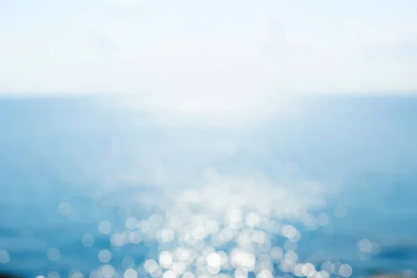 Abstrato Bokeh Luz Solar Fundo Mar Azul Para Temporada Verão — Fotografia de Stock
