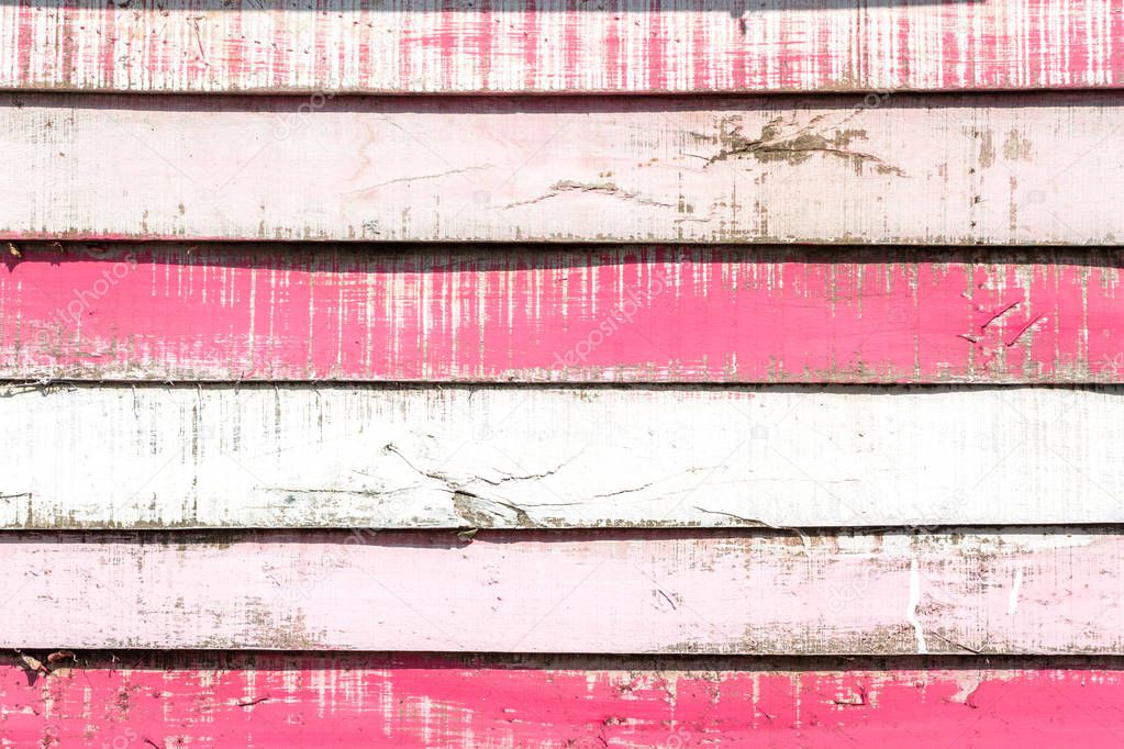 Pink wood texture background. Vintage grunge white pink wooden plank pattern surface pastel painted wall. Wood board grain table top, desk, panel and cracked wood craft nature material.