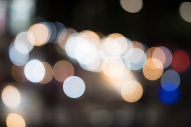 Soyut ışıkları gece hayatı bokeh arka plan bulanık veya retro vintage renk tonlu parti.