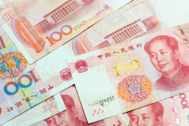Birçok yüz Çin yuan banknotlar, arka plan olarak Çin para birimi.