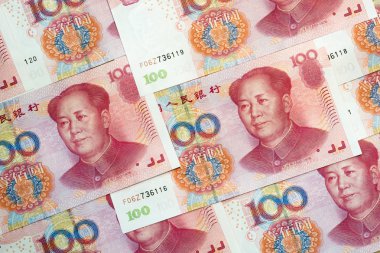 Yüz Çin yuan faturaları yığını para arka plan olarak. Çin'in para birimi.