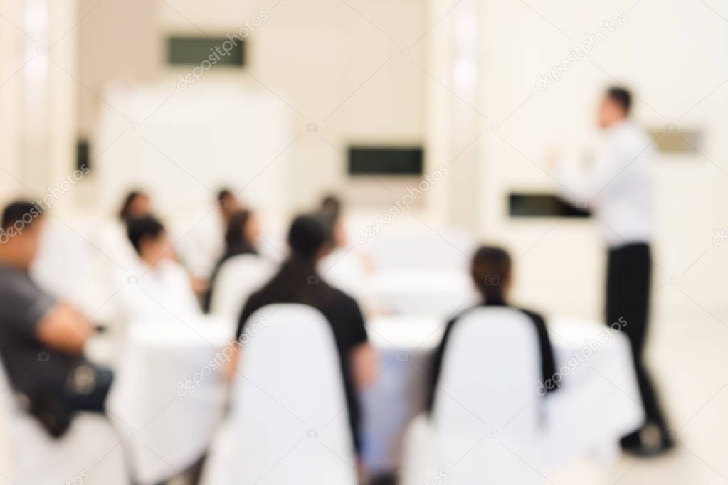 Blurred background of group of business people have seminars and business training to enhance sale skils and work planning to achieve goals in hotels meeting room. 