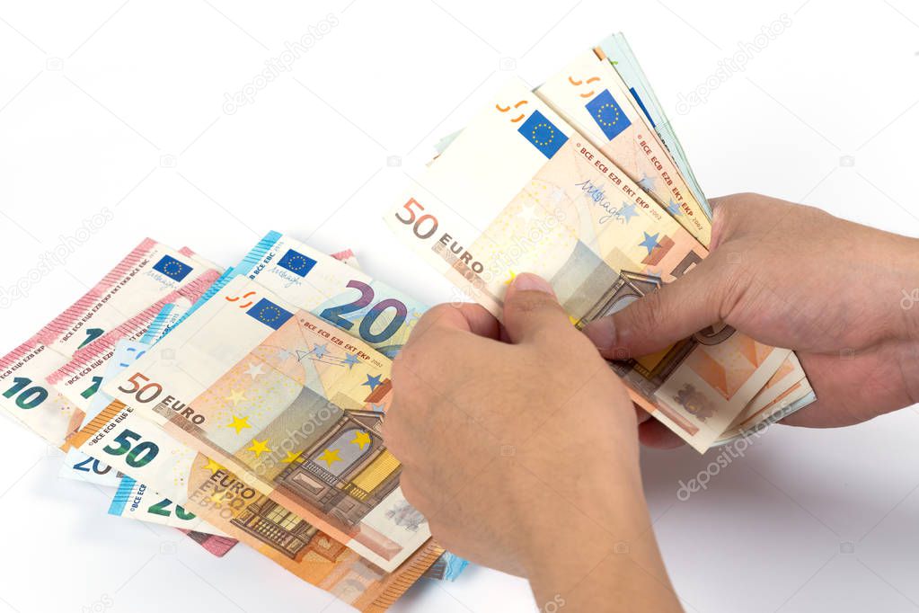 Businessman counting euro money bills on white background in concept of money exchange, business and financial.
